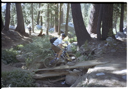 Jimmy rides across a creek