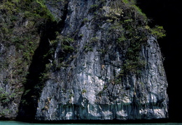 Rock formation jutting out of the Andaman Sea