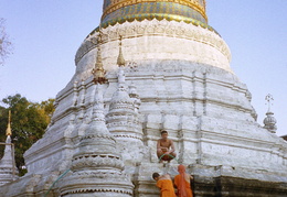 monks cleaning a temple, Chiang Mai