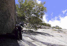 Karl leads past the wet rock