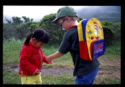 Caleb shows Maggie a bug