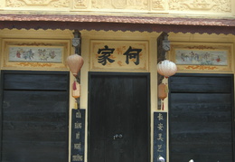 Vietnamese flag hangs above an old colonial building