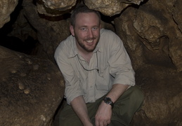 Christian in a cave