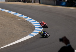 Stoner chases Valentino in the corkscrew