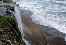 water spilling into the ocean