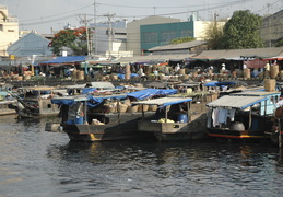 boats along a riverside market