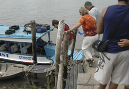 boarding another boat on the Meekong