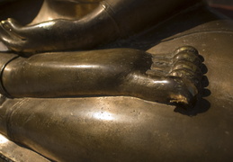 Buddha's feet in a yoga pose