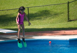 Maggie jumping off the board